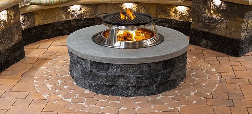 Ducon outdoor firepit with integrated seating in a luxury garden lounge