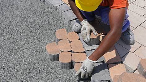 Step 3 — Professional paver installation in progress